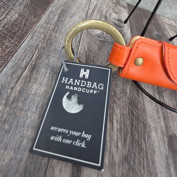 Handbag Handcuff Bag Restraint Security Cuff Strap Gift Orange Faux Leather New - Picture 2 of 8